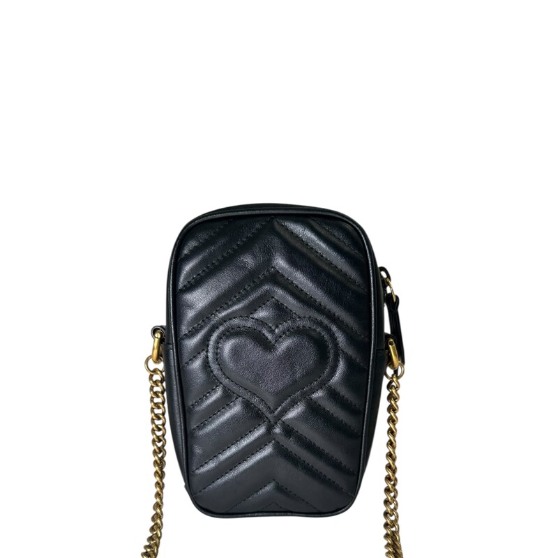 Gucci Marmont Phone Vertical Phone Crossbody Bag<br />
<br />
Date Code: 598597 04116<br />
<br />
Dimensions:<br />
4W x 6.5H x 2D<br />
None handle drop<br />
22 strap drop<br />
<br />
In very good condtion. Light scuffs to the back corners.<br />
<br />
Does not come with the original dust bag or box.