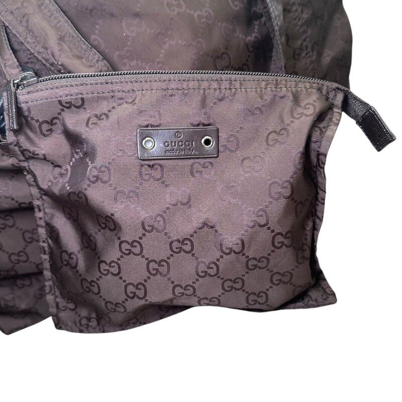 Gucci Nylon Guccissima Tote Dark Brown Large<br />
<br />
Date Code 233094 491403<br />
<br />
Dimensions:<br />
W 24in x H15in<br />
<br />
In very good condition. Comes with small detachable pouch.<br />
<br />
Come with the original dust bag. No box.