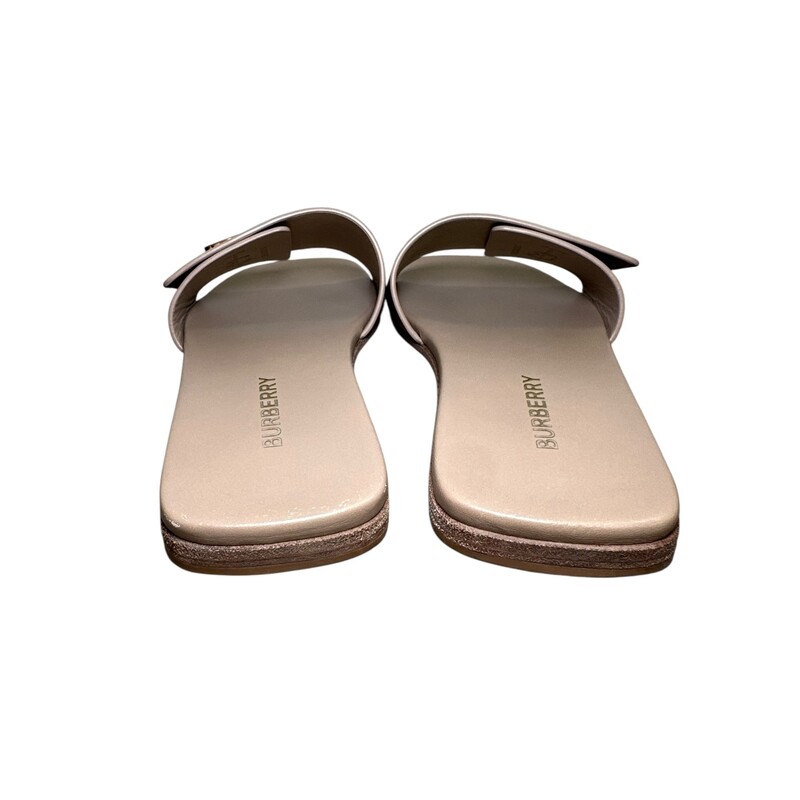 Burberry TB Leather Logo Slides<br />
<br />
Size 36.5<br />
<br />
Serial Code:ITFALSRL8PEO<br />
<br />
In very good condition. Some wear on the bottoms of the shoes and very faint scratching of the leather on the front part of the shoes.<br />
<br />
Comes with the original dust bag. No box.