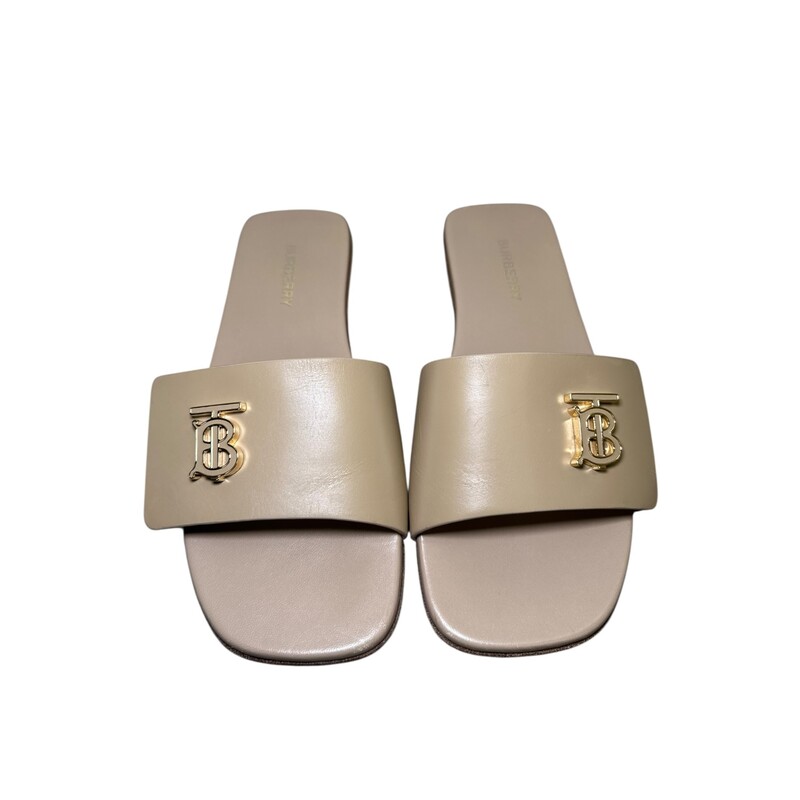 Burberry TB Leather Logo Slides<br />
<br />
Size 36.5<br />
<br />
Serial Code:ITFALSRL8PEO<br />
<br />
In very good condition. Some wear on the bottoms of the shoes and very faint scratching of the leather on the front part of the shoes.<br />
<br />
Comes with the original dust bag. No box.