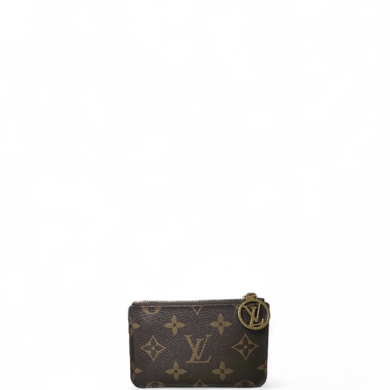 Louis Vuitton Romy Card Monogram

Code: Chipped

Dimensions:
4.7 x 3.1 x 0.3 inches
(Length x Height x Width)

In good condition. Card holders and zipper pocket are stretched from use. Scratching to hardware.

Does not come with the original dust bag or box.