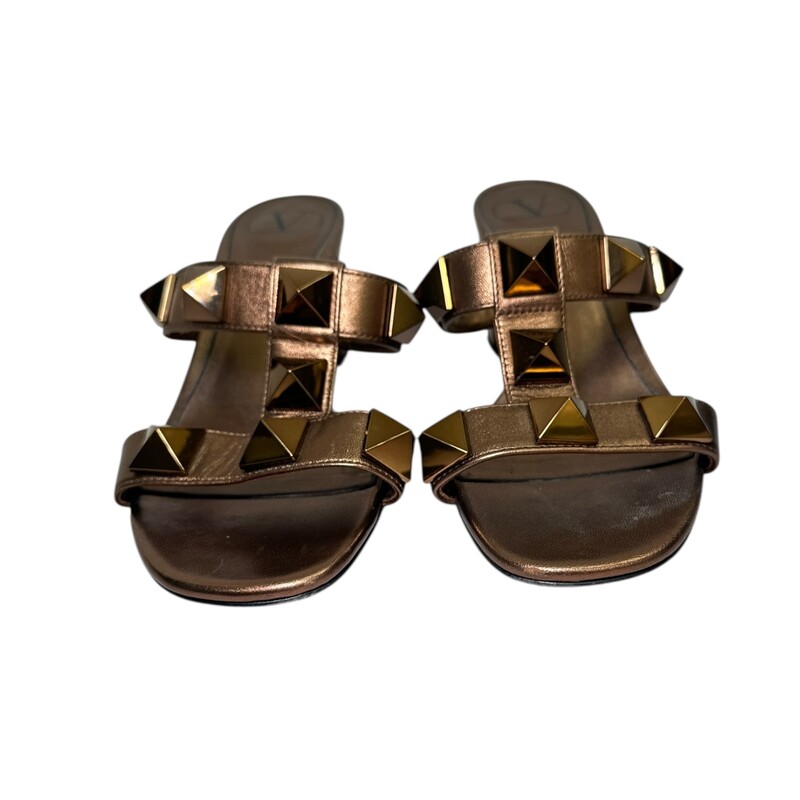 Valentino Roman Slide Bronze Heels<br />
<br />
Size: 36.5<br />
<br />
2 EP 5 2<br />
<br />
In very good condition. Light scuffing to the leather.<br />
<br />
Does not come with the original dust bag or box.
