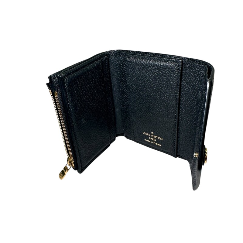 Louis Vuitton Zoe Monogram Leather Wallet

Date Code: Microchip

Dimensions: 4 L X 3 H inches

In very good condition. Some scratches on the hardware.

Comes with the original dust bag and box.