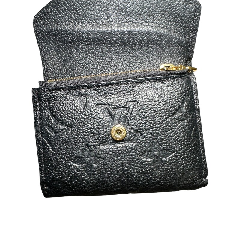 Louis Vuitton Zoe Monogram Leather Wallet<br />
<br />
Date Code: Microchip<br />
<br />
Dimensions: 4 L X 3 H inches<br />
<br />
In very good condition. Some scratches on the hardware.<br />
<br />
Comes with the original dust bag and box.
