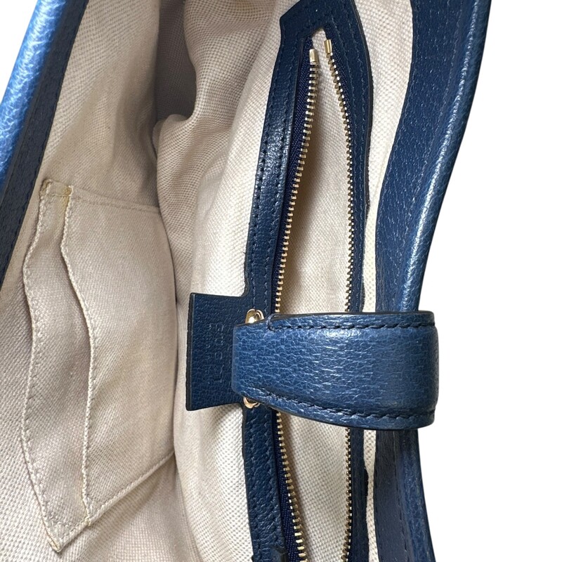 Gucci Flora Jackie Blue Shoulder Bag<br />
<br />
Style Code:550152 213317<br />
<br />
Dimensions: 13 L x 8 H inches<br />
<br />
In very good condition. Some interior marks.<br />
<br />
Comes with the original dust bag. No box.