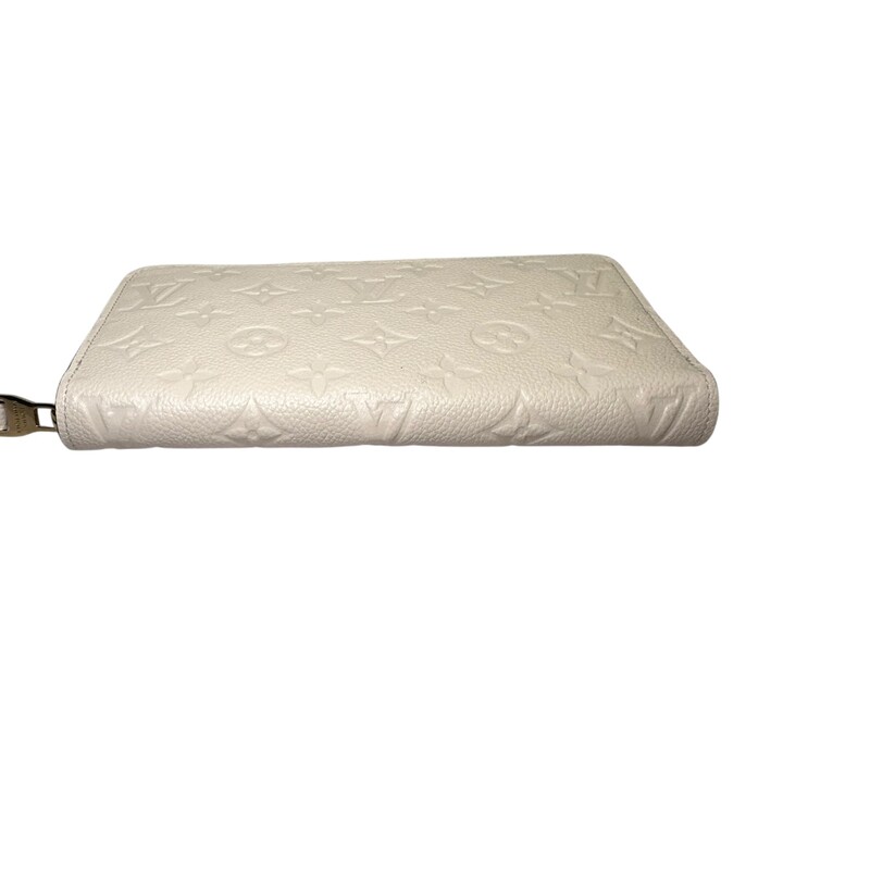 Louis Vuitton Zippy Monogram Empreinte Leather<br />
<br />
Date Code: Microchip<br />
<br />
Dimensions:7.7 x 4.1 x 1 inches<br />
                       (Length x Height x Width)<br />
<br />
In very good condition. Very light hardware marks.<br />
<br />
Does not come with the original dust bag or box.