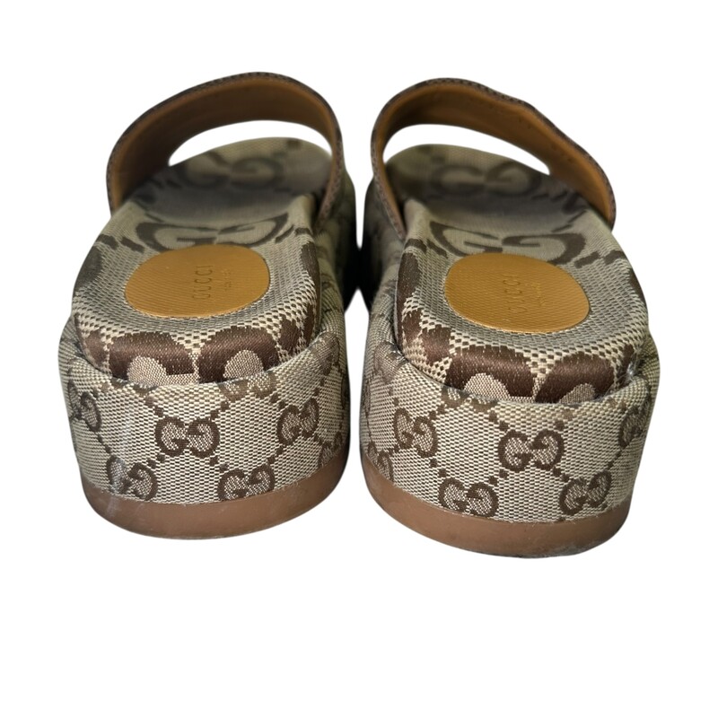 Gucci Angelina Platform Slide Sandals<br />
<br />
Size: 37<br />
<br />
Style Code: 623212 07 B<br />
<br />
In very goos condition. Slight marks on the soles of the base.<br />
<br />
Comes with the original dust bag and box.