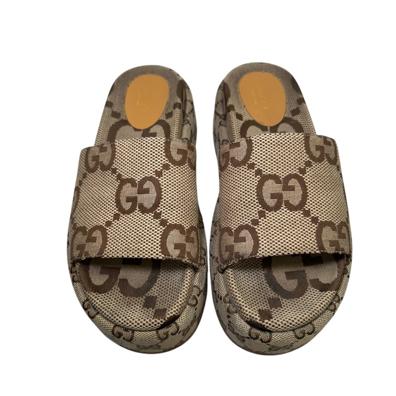 Gucci Angelina Platform Slide Sandals<br />
<br />
Size: 37<br />
<br />
Style Code: 623212 07 B<br />
<br />
In very goos condition. Slight marks on the soles of the base.<br />
<br />
Comes with the original dust bag and box.