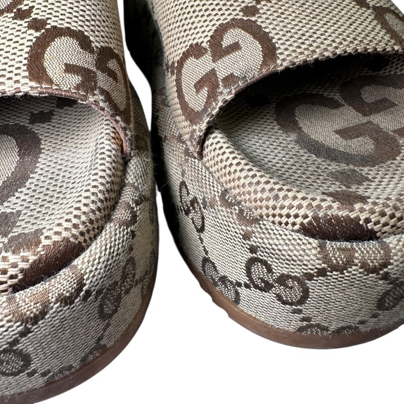 Gucci Angelina Platform Slide Sandals<br />
<br />
Size: 37<br />
<br />
Style Code: 623212 07 B<br />
<br />
In very goos condition. Slight marks on the soles of the base.<br />
<br />
Comes with the original dust bag and box.