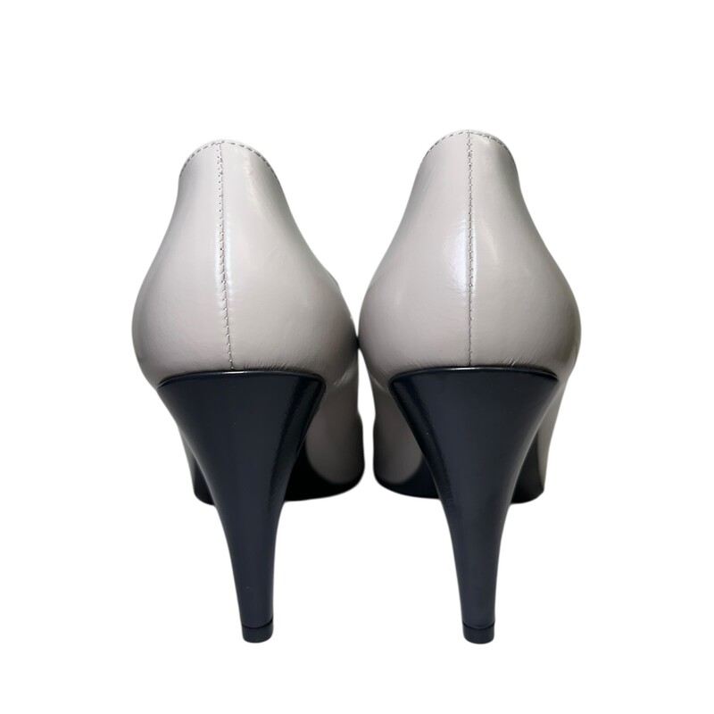 Chanel Maryjane  Captoe Leather Two Tone<br />
<br />
Gray & Black Leather Heels<br />
<br />
37.5<br />
<br />
Style Code:  G39111<br />
<br />
In excellent condition. Like new .<br />
<br />
Comes with the orginal dust bag and box.