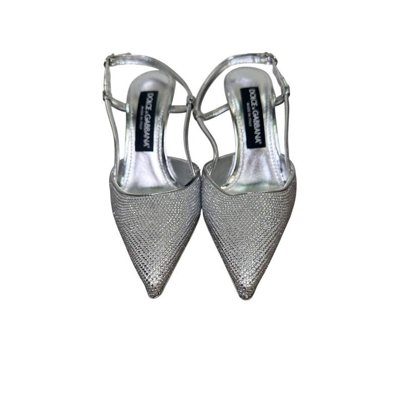 Dolce & Gabbana Silver Rhinestone Slingback Heels<br />
<br />
Size: 37<br />
<br />
Good Condition<br />
<br />
Light wear to the bottom of the shoes and light discoloration to the right shoe<br />
<br />
Does not come with dust bag or box.