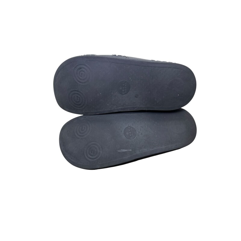 Gucci Black Rubber GG Slides<br />
<br />
Style Code: 573922 160<br />
<br />
in very good condition. Some scuffs on the rubber<br />
<br />
Does not come with the original dust bag or box.