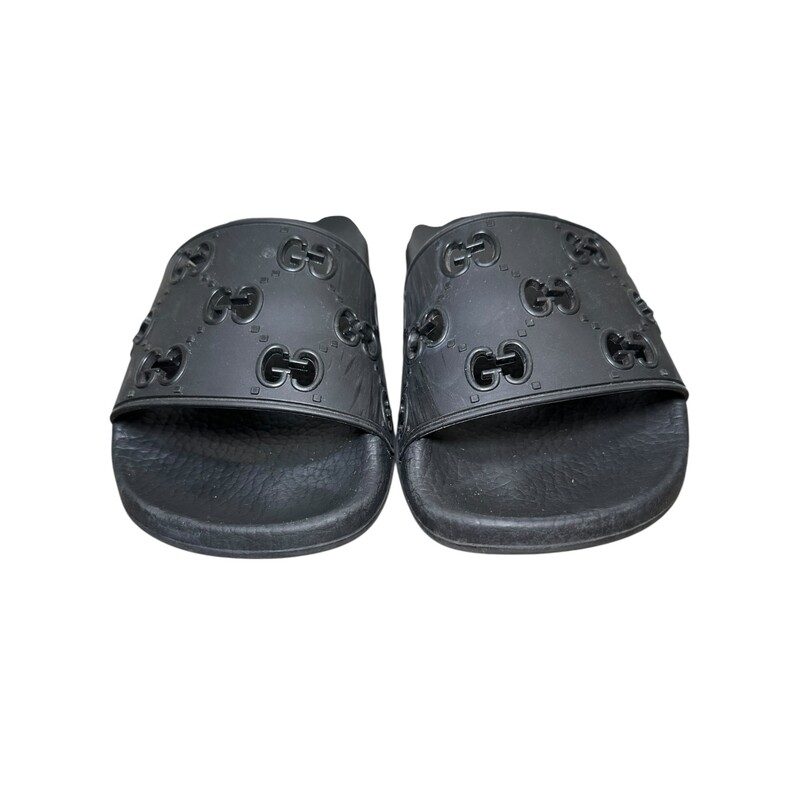 Gucci Black Rubber GG Slides<br />
<br />
Style Code: 573922 160<br />
<br />
in very good condition. Some scuffs on the rubber<br />
<br />
Does not come with the original dust bag or box.
