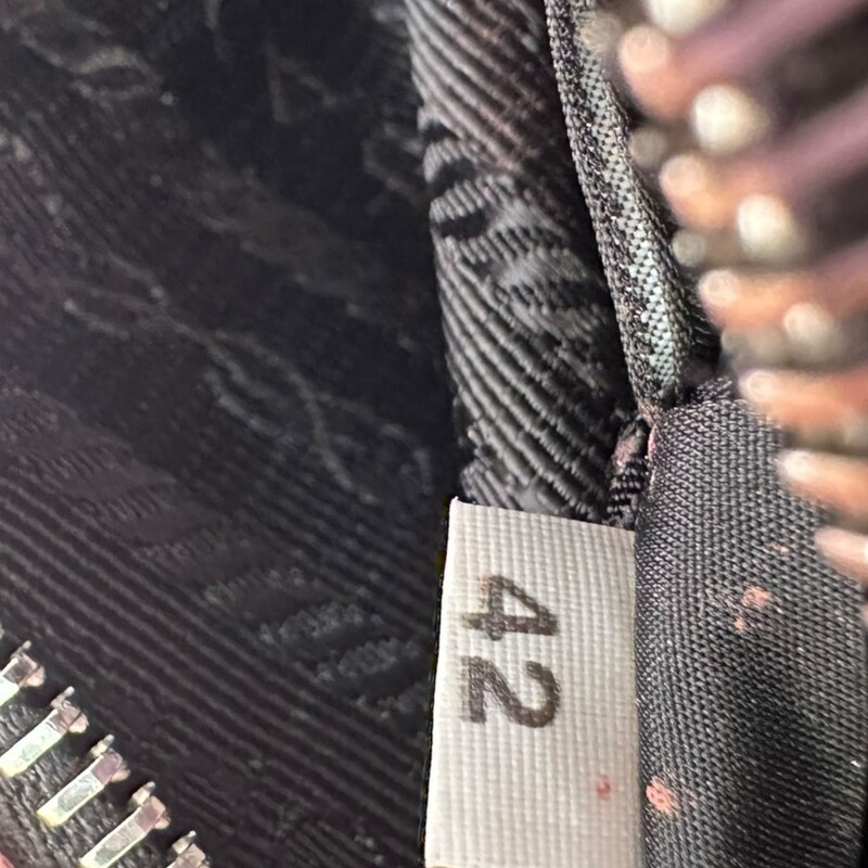 Prada Re-Nylon Re-Edition 200 Mini Bag Black<br />
<br />
Code 42<br />
<br />
Dimensions:<br />
Height: 17cm<br />
Width: 22cm<br />
Length: 6cm<br />
<br />
In very good condition. Light scratching to the hardware. Light mark on nylon.<br />
<br />
Does not come with the original dust bag or box.