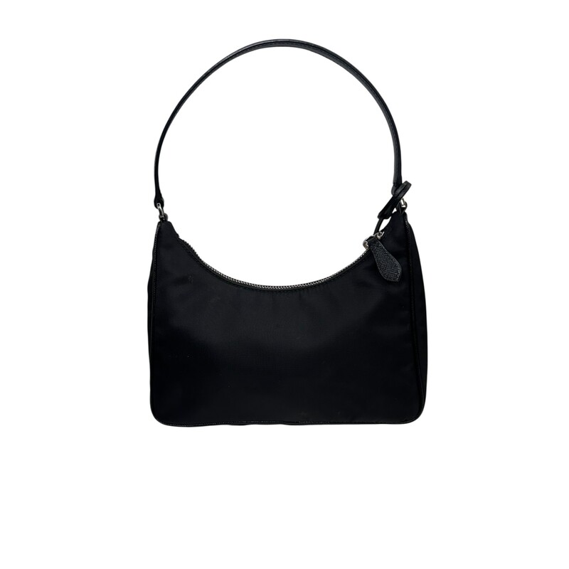 Prada Re-Nylon Re-Edition 200 Mini Bag Black<br />
<br />
Code 42<br />
<br />
Dimensions:<br />
Height: 17cm<br />
Width: 22cm<br />
Length: 6cm<br />
<br />
In very good condition. Light scratching to the hardware. Light mark on nylon.<br />
<br />
Does not come with the original dust bag or box.