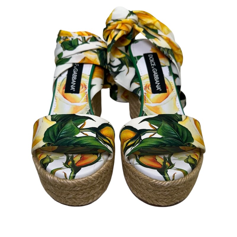 Dolce & Gabbana Lolitia  Floral Tie Print Silk Wedge<br />
<br />
StyleCode :CZ0312<br />
<br />
In very good condition. Minor pen marks on the bottom of the shoes.<br />
<br />
Does not come with the original dust bag or box.