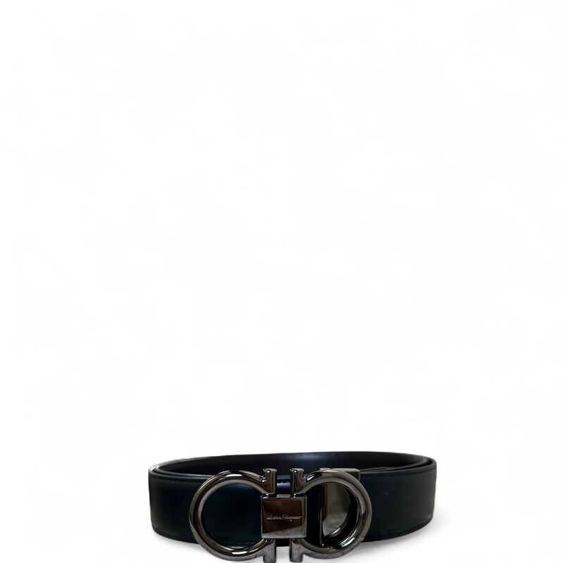 Ferragamo Reversible Black/Dark Brown Silver

Measurements 100cm middle hole

In very good condition. Light wear to the hardware.

Does not come with the original dust bag or box.