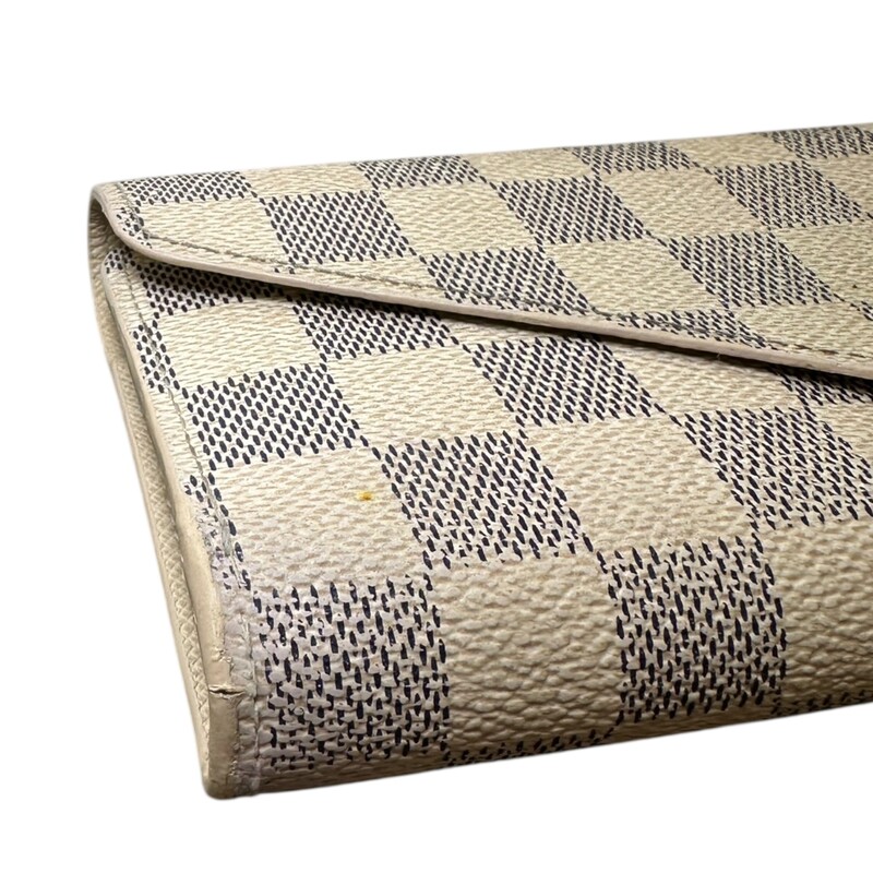 Louis Vuitton Josephine Azur Wallet with Pouch<br />
<br />
Date Code:TN4182<br />
<br />
Dimensions: 7 L x 4 H inches<br />
<br />
In good condition. Some marks through out the canvas. Pen mark on the interior and slight warping of the interior canvas.<br />
<br />
Comes with the original dust bag and box.