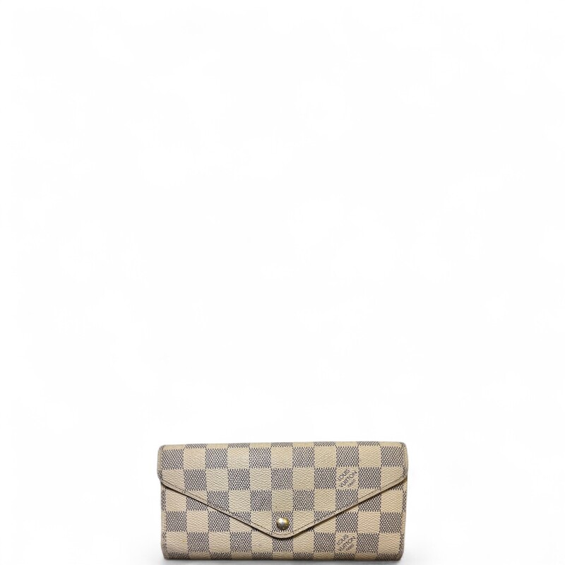 Louis Vuitton Josephine Azur Wallet with Pouch

Date Code:TN4182

Dimensions: 7 L x 4 H inches

In good condition. Some marks through out the canvas. Pen mark on the interior and slight warping of the interior canvas.

Comes with the original dust bag and box.