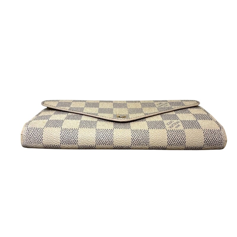 Louis Vuitton Josephine Azur Wallet with Pouch<br />
<br />
Date Code:TN4182<br />
<br />
Dimensions: 7 L x 4 H inches<br />
<br />
In good condition. Some marks through out the canvas. Pen mark on the interior and slight warping of the interior canvas.<br />
<br />
Comes with the original dust bag and box.