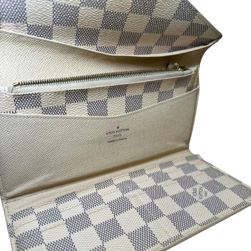 Louis Vuitton Josephine Azur Wallet with Pouch<br />
<br />
Date Code:TN4182<br />
<br />
Dimensions: 7 L x 4 H inches<br />
<br />
In good condition. Some marks through out the canvas. Pen mark on the interior and slight warping of the interior canvas.<br />
<br />
Comes with the original dust bag and box.