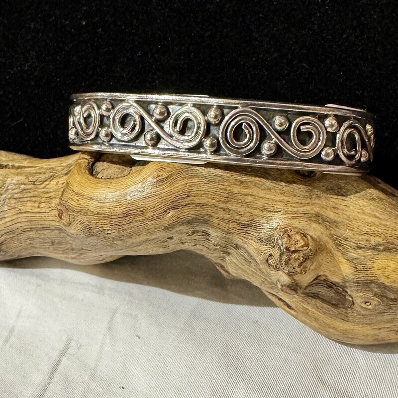 Sterling swirly bracelet.