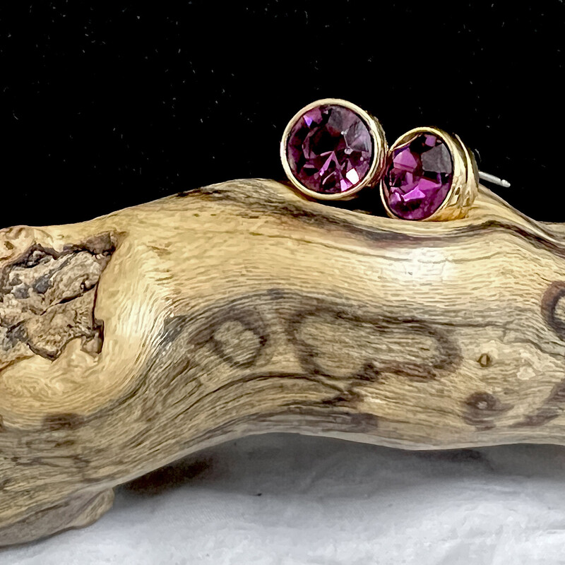 Sparkly purple stone earrings.