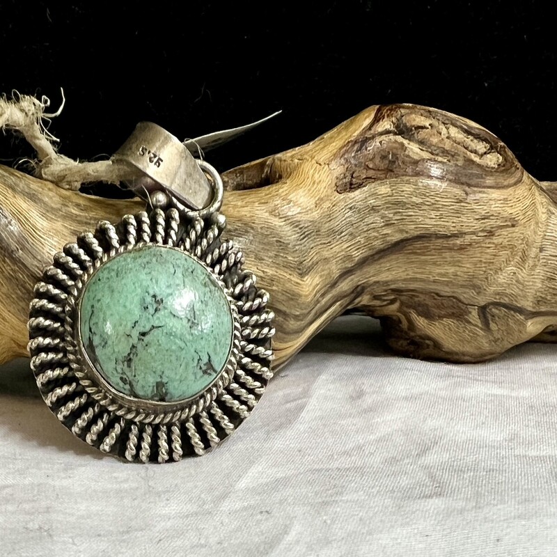 Sterling turquoise sunburst pendant.