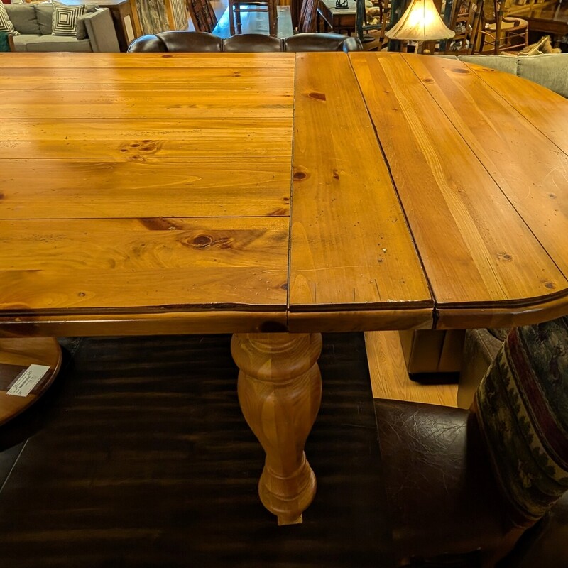 Farm Style Table, Light Stain<br />
2- 18in Rounded Leaves<br />
68 x 43