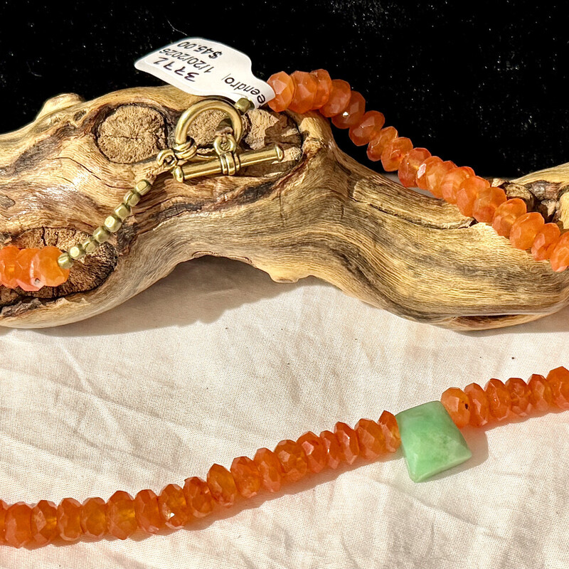 Orang faceted beads with green pendant