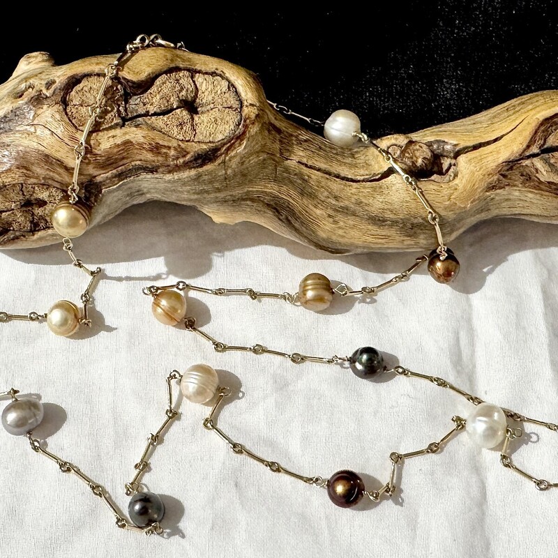 14K necklace with spaced multi colored pearls