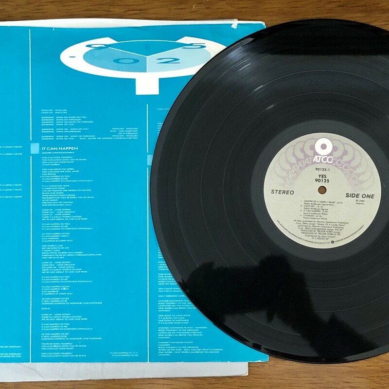 YES 90125 LP Vinyl Album c.1983. Album condition is excellent; cover condition is good. Original paper sleeve with lyrics.