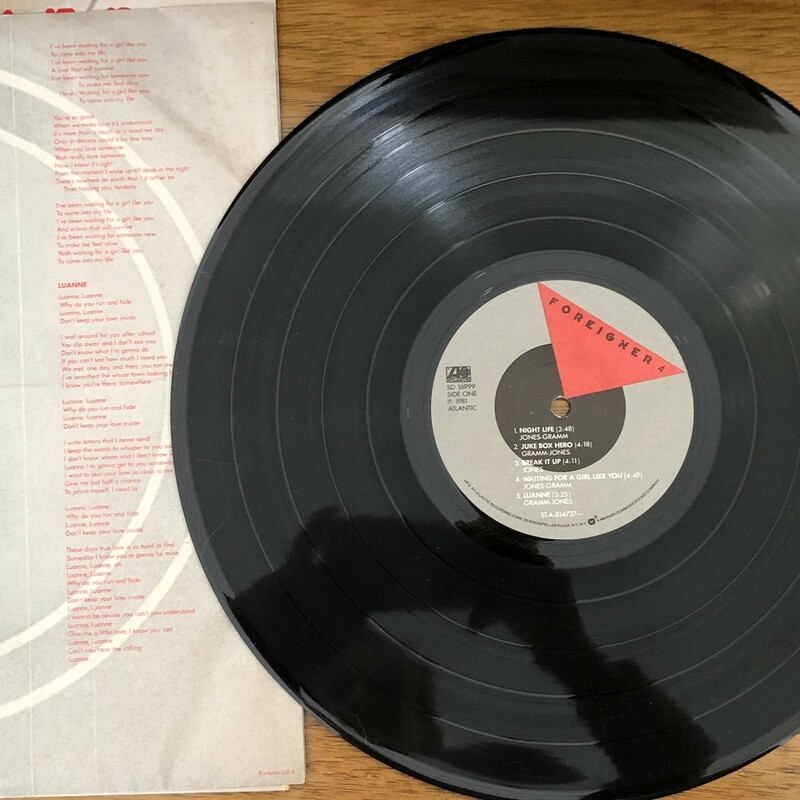 Foreigner 4 LP Vinyl album c.1981. Album condition is excellent, cover condition is good. Original paper sleeve with lyrics.