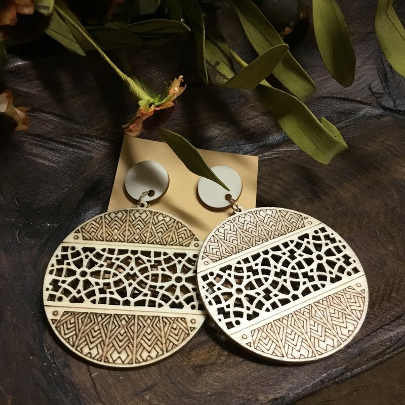 These cream aztec earrings are wooden and lightweight! They measure 3.25 inches long.