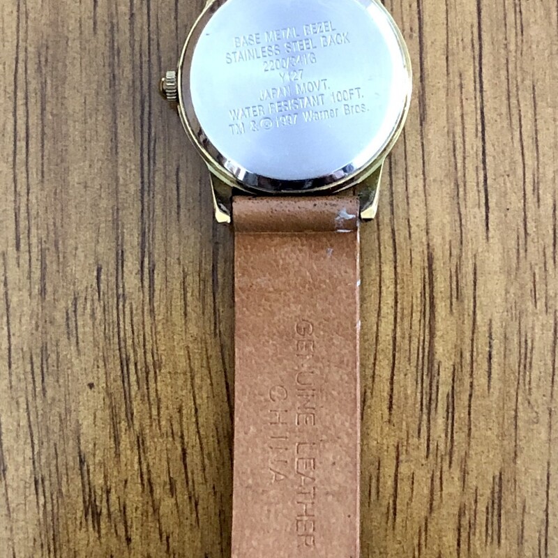 Armitron Warner Bros. 1997 Tweety Bird Watch. Has a cool dimentional look with Tweety in the background and second hand features moving butterflies. Original leather band with embossed butterflies. Will need a battery.