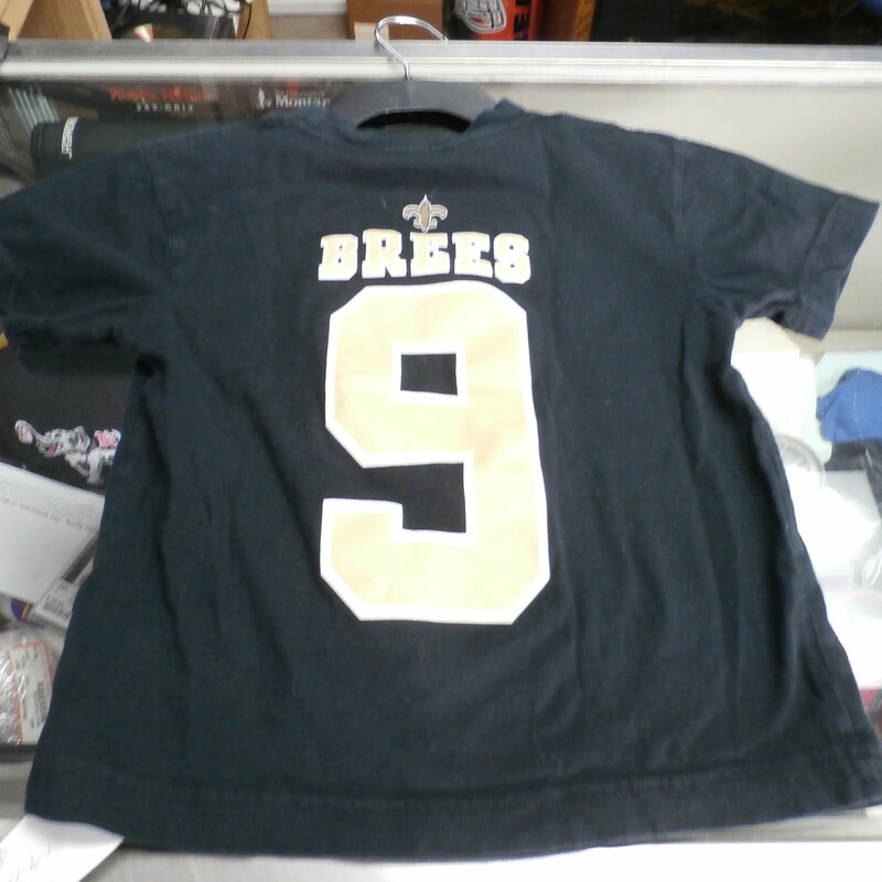 New Orleans Saints #9 Drew Brees YOUTH shirt size Medium 5/6 black cotton #19212
Rating:   (see below) 3- Good Condition
Team: New Orleans Saints
Player: Drew Brees #9
Brand: NFL
Size :  Medium 5/6 - YOUTH ( Chest: 13\" x Length: 17\" ) measured armpit to armpit and shoulder to hem
Color: Black
Style: Crew neck shirt; short sleeve; screen pressed
Material :  100% Cotton;
Condition: 3 -Good Condition -  noticeable pilling and fuzz; wrinkled; fabric is slightly faded and discolored from washing and use;
Item #: 19212
Shipping: FREE