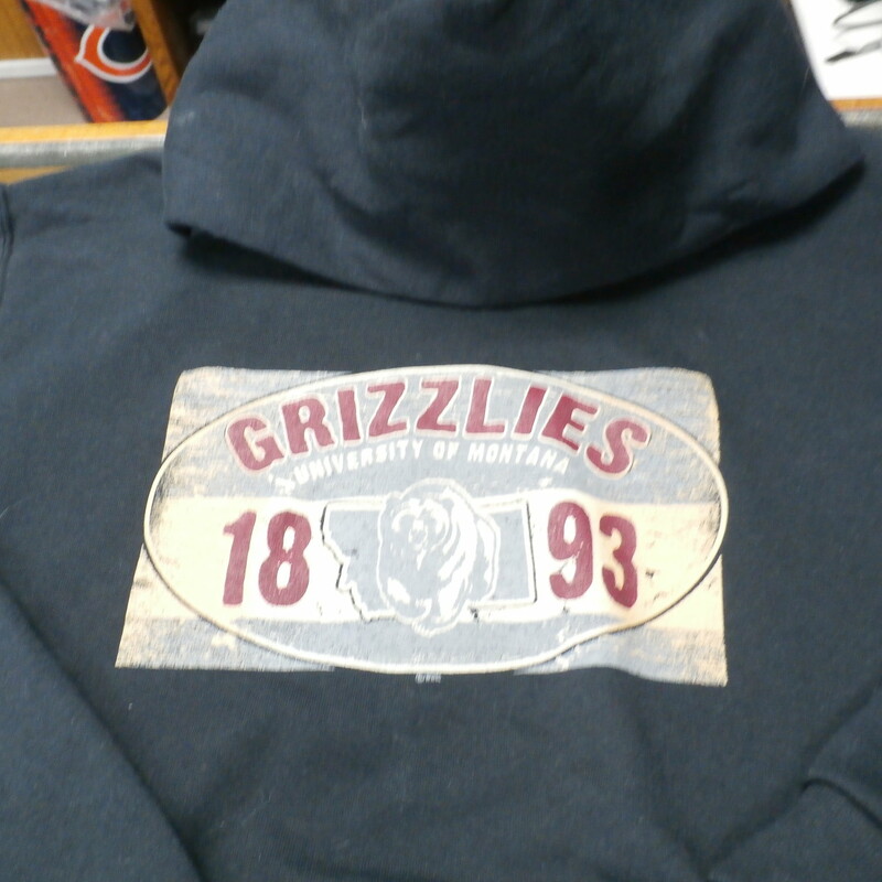 NCAA YOUTH Montana Griz Hoodie Black Size Large Cotton Blend #19447<br />
Rating:   (see below) 2 - Great Condition<br />
Team: n/a<br />
Player:  n/a<br />
Brand: Jerzees<br />
Size : Large Unisex Children - Youth (Measured Flat: Chest 17\"; Length 24\";) measured armpit to armpit; and shoulder to hem<br />
Color: Black<br />
Style:  long sleeve; hoodie; screen pressed<br />
Material: 50 Cotton 50 Polyester<br />
Condition: 2 - Great Condition - minor pilling and fuzz; slight stretch from wear and wash; fabric crisp; screen press is good the design is suppose to look cracked; (see photos)<br />
Item #: 19447<br />
Shipping: FREE