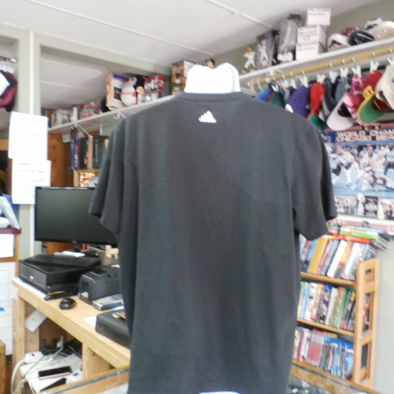 adidas Men's shirt black size Large Screen Pressed Cotton Blend #20402<br />
Rating: (see below) 3 - Good Condition<br />
Team: n/a<br />
Player:  n/a<br />
Brand: adidas<br />
Size : Large- Men's ( Measures Chest 21\" ; Length 25\") armpit to armpit; shoulder to hem<br />
Color: Black<br />
Style: short sleeve screen pressed;<br />
Material: 65% Polyester; 35% Cotton<br />
Condition: 3 - Good Condition - wrinkled; minor pilling and fuzz; slightly stretched from wear and wash; gently used; a few minor snags; discolored and faded<br />
Item #: 20402<br />
Shipping: FREE