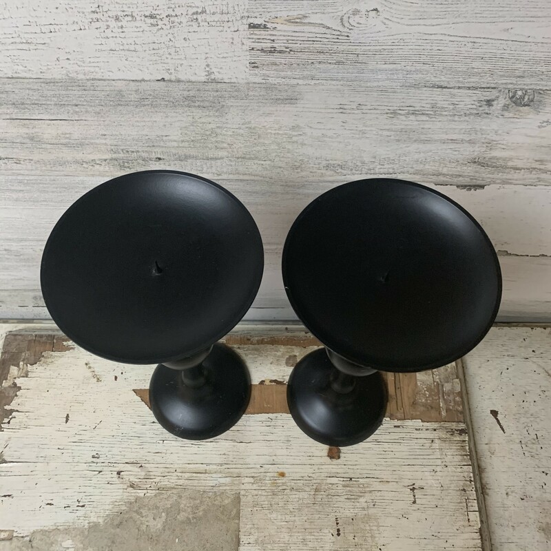 Pair of metal black candlestick holders. Beautiful accent/statement for any occasion or celebration.
Measures 12'' tall, 5 1/2'' top diamter, 4 1/2'' base diamter.
Please make sure to look at all the pictures.