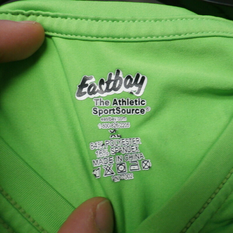Eastbay sleeveless athletic shirt neon green size XL polyester blend #21692
Rating: (see below) 4- Fair Condition
Team: n/a
Player: n/a
Brand: Eastbay
Size: Men's- XL (Chest: 18\" x Length: 28\";) measured flat - armpit to armpit and shoulder to hem
Color: neon green
Style:  sleeveless
Material: 84% polyester 16% spandex
Condition: 4- Fair Condition;  wrinkled; heavy pilling and fuzz; material is worn from wearing and washing; noticeable stains and snags throughout
Item #: 21691
Shipping: FREE