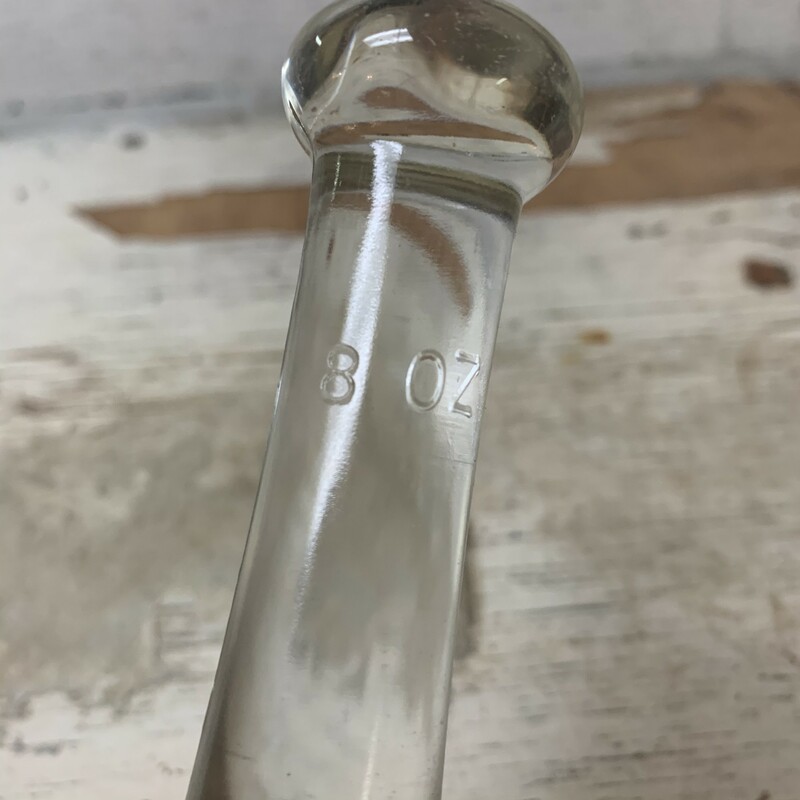 Clear glass pestle, marked ''8 oz.'' Have a scratches from previous uses, no cracks, no chips.Measures 6'' long and weights 8.8 oz.<br />
Please make sure to look at all the pictures.<br />
Thank you so much for your business.