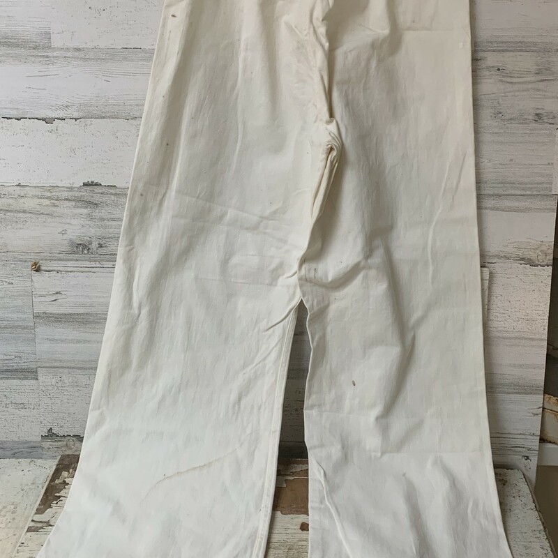 This 4 piece outfit is made of a heavy weight cotton drill fabric in a white. Included two rounded, upturned brim sailor's caps. The caps are near mint condition, have lots of spots on them as well as the uniform itself, please make sure to look at all the pictures.
Patch represents ''Storekeeper!'
Pants are classic wide-leg, semi-bell-style and high waisted.

Measures approx - caps -  inner rim widht 10 1/2'',  inner diameter 6'', height 3''
Top - chest widht 19'', sleeve lenght 20'', total lenght 26''.
Pants - waist widht 16'', inseam 30 1/2'', outseam 43''.

Thank you so much for your business!