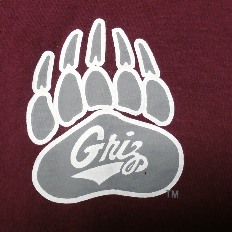 Montana Grizzlies YOUTH Gildan shirt maroon size M 100% cotton #22181
Rating: (see below) 3 - Good Condition
Team: Montana Grizzlies
Player:  n/a
Brand: Gildan
Size : Youth- Medium ( Measures Chest 17\" ; Length 21.5\") armpit to armpit; shoulder to hem
Color: maroon
Style: short sleeve; screen printed
Material: 100% Cotton
Condition: 3- Good Condition; wrinkled; some pilling and fuzz; material is stretched and worn from wearing and washing; some fading and discoloration; screen printing looks fresh and new; two light white spots on back (see photos)
Item #: 22181
Shipping: FREE