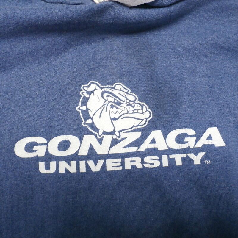 Gonzaga Bulldogs YOUTH hoodie blue size Large 14-16 poly cotton blend #22143<br />
Rating: (see below) 4- Fair Condition<br />
Team: Gonzaga Bulldogs<br />
Player:  team<br />
Brand: Kid N' Me<br />
Size : Youth- Large 14-16 ( Measures Chest 18\" ; Length 21.5\") armpit to armpit; shoulder to hem<br />
Color: blue<br />
Style: long sleeve; screen printed<br />
Material: 150% cotton 50% polyester<br />
Condition: 4- Fair Condition; wrinkled; some pilling and fuzz; material is stretched and worn from wearing and washing; some fading and discoloration; large 3-inch stain next to logo; several smaller stains on front; logo is cracked (see photos)<br />
Item #: 22143<br />
Shipping: FREE