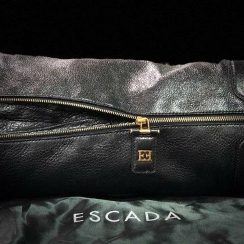 ESCADA, Black, Size: Shoulder<br />
This is a Gorgeous Large Black Leather Authentic ESCADA Handbag.<br />
Made in Italy!<br />
Comes with the original satin dust bag.<br />
The handbag features a gold turn lock closure with chain.  The bag has a zippered bottom for full expansion.  Leather is in excellent condition and looks like new.  The interior is flawless with a zipper pocket and two silde open pockets.<br />
This Handbag is no longer being made and is a Rare Find.<br />
The consignor of this Handbag gently carries her handbags and frequently consigns with us.  Her taste is impeccable and flawless.  You will not ne disappointed with this handbag.
