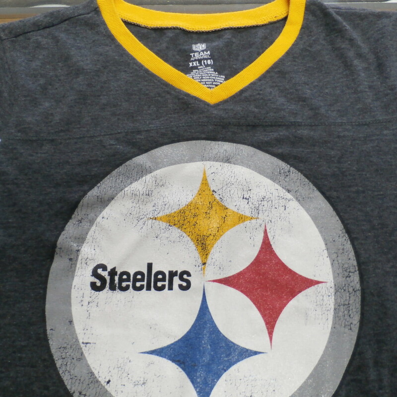 Pittsburgh Steelers Girls shirt gray size 2XL(16) cotton blend # 22745
Rating: (see below) 3- Good Condition
Team: Pittsburgh Steelers
Player: Team
Brand: NFL Team Apparel
Size: GIRLS 2XL (Chest: 16\" x Length: 23\";) measured flat - armpit to armpit and shoulder to hem
Color: Gray
Style:  Cap sleeve; screen pressed
Material: 50% cotton; 50% Polyester
Condition: 3- Good Condition;  wrinkled; some pilling and fuzz; material is worn from wearing and washing; minor fading or discoloration; screen printing looks good; screen printed is distressed but its meant to look this way
Item #: 22745
Shipping: FREE