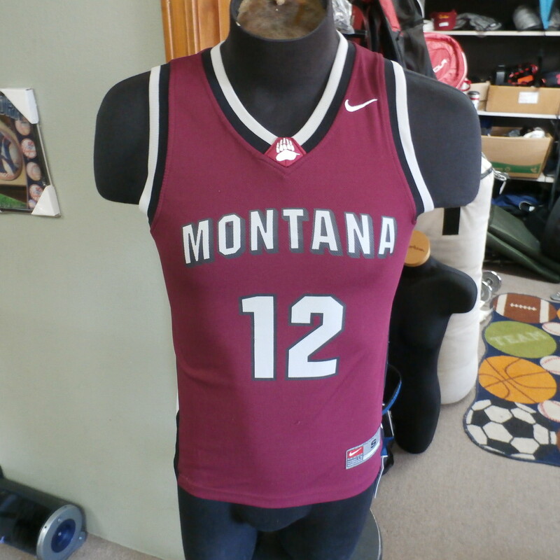 Montana Grizzlies Nike men's tank top Maroon size small #22839<br />
Rating: (see below) 3- Good Condition<br />
Team: Montana Grizzlies<br />
Player: n/a<br />
Brand: Nike<br />
Size: Small- men's (Measured Flat: chest 17\", length 24\")<br />
Color: Maroon<br />
Style: sleeveless; screen printed<br />
Material: 100% polyester<br />
Condition: 3- Good Condition - some pilling and fuzz; some fading and discoloration; wrinkles; some stretching and wear from washing and wearing; screen printing is worn and faded; small rip in the \"O\" on the front; 3 dark streaks on \"2\" on the back (see photos)<br />
Item #: 22839<br />
Shipping: FREE