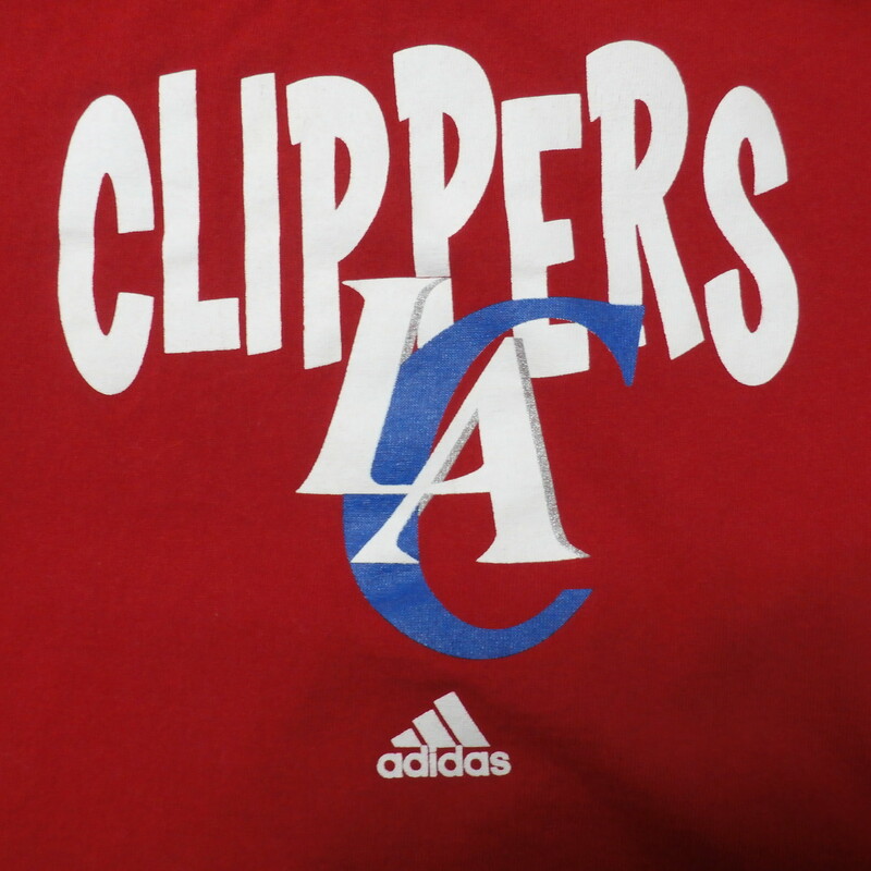 Los Angeles Clippers YOUTH shirt red Adidas size M (5/6) 100% cotton #22807
Rating: (see below) 2- Great Condition
Team: LA Clippers
Player: Team
Brand: Adidas
Size: Boy's Medium 5/6- (Measured Flat: chest 14\", length 17\")
Color: red
Style: short sleeve; screen printed
Material: 100% cotton
Condition: 2- Great Condition; wrinkled; some pilling and fuzz; material is stretched and worn from wearing and washing; some discoloration and fading; no rips or tears; screen printing looks fresh and new; no stains (see photos)
Item #: 22807
Shipping: FREE