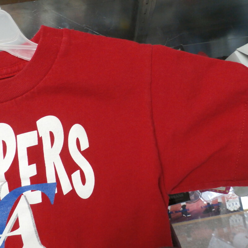 Los Angeles Clippers YOUTH shirt red Adidas size M (5/6) 100% cotton #22807<br />
Rating: (see below) 2- Great Condition<br />
Team: LA Clippers<br />
Player: Team<br />
Brand: Adidas<br />
Size: Boy's Medium 5/6- (Measured Flat: chest 14\", length 17\")<br />
Color: red<br />
Style: short sleeve; screen printed<br />
Material: 100% cotton<br />
Condition: 2- Great Condition; wrinkled; some pilling and fuzz; material is stretched and worn from wearing and washing; some discoloration and fading; no rips or tears; screen printing looks fresh and new; no stains (see photos)<br />
Item #: 22807<br />
Shipping: FREE