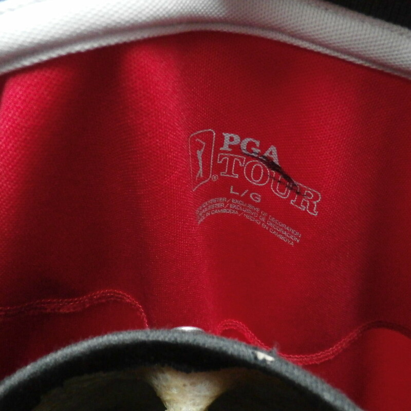 Rating: (see below) 3- Good Condition
Team: N/A
Player: N/A
Brand: PGA TOUR
Size: Men's - Large (Measured Flat: chest 23\", length 30\")
Color: Red
Style: Short sleeve Polo; Embroidered logo
Material: 100% Polyester
Condition: 3 - Good Condition; wrinkled; material looks and feels good; black mark on the top of the left shoulder; some light snags; signs of use; no rips or holes